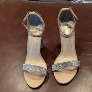 Lulu's Taylor Glitter Silver Ankle Strap Heels.  Comes with a shoe cover bag.